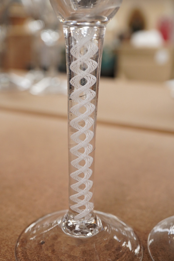 Two 18th century DSOT cordial glasses, one bowl engraved with roses, the other with swag decoration, tallest 16.5cm